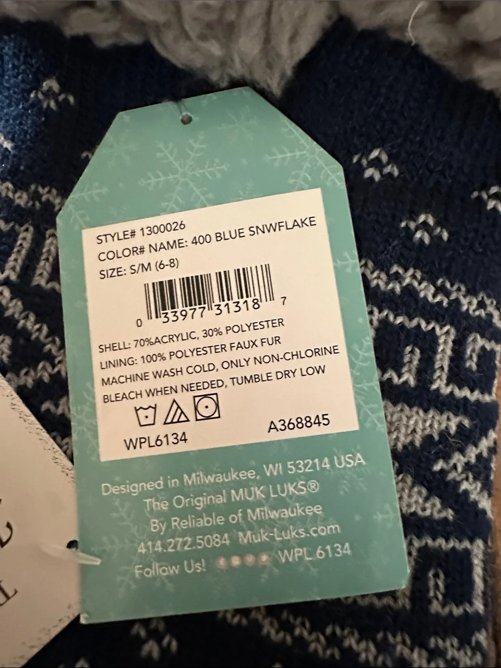 MUK LUkS Cozy Navy Blue Sherpa-Lined Cabin Slipper Socks with gripper bottom